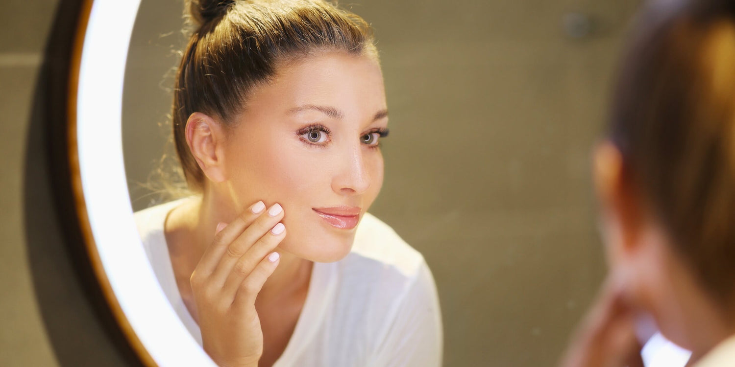 Mature woman with fine lines and wrinkles around her eyes and mouth, searching for anti-aging solutions