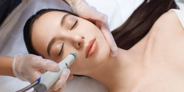 Client undergoing deep cleansing and hydration with HydraFacial treatment for glowing, refreshed skin.